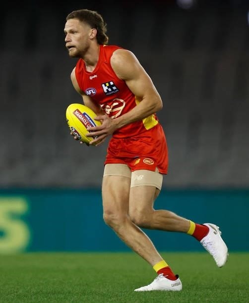 Jy Farrar of the Suns in action during the 2021 AFL Round 20 match between the Gold Coast Suns and the Melbourne Demons at Marvel Stadium on August...