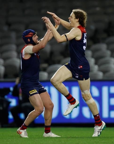 Angus Brayshaw and Ben Brown of the Demons celebrate during the 2021 AFL Round 20 match between the Gold Coast Suns and the Melbourne Demons at...