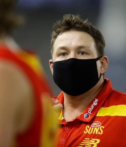 Stuart Dew, Senior Coach of the Suns looks on during the 2021 AFL Round 20 match between the Gold Coast Suns and the Melbourne Demons at Marvel...