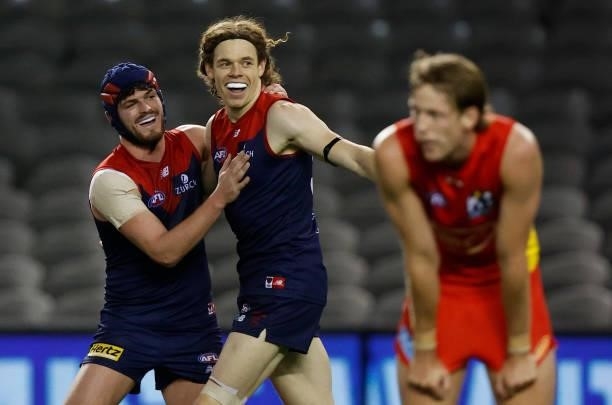 Angus Brayshaw and Ben Brown of the Demons celebrate during the 2021 AFL Round 20 match between the Gold Coast Suns and the Melbourne Demons at...