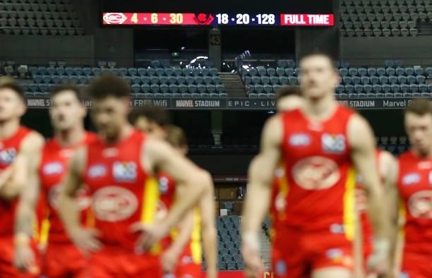The final scoreboard is seen as the Suns leave the field during the 2021 AFL Round 20 match between the Gold Coast Suns and the Melbourne Demons at...