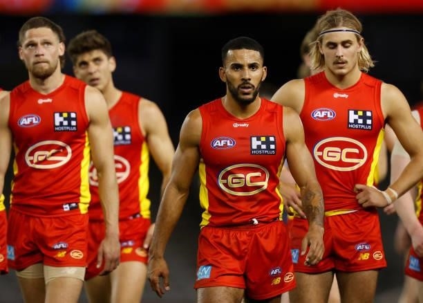 Touk Miller of the Suns looks dejected after a loss during the 2021 AFL Round 20 match between the Gold Coast Suns and the Melbourne Demons at Marvel...
