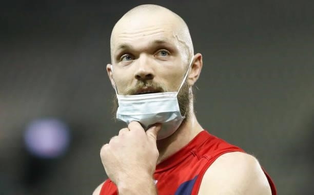 Max Gawn of the Demons is seen wearing a mask during the 2021 AFL Round 20 match between the Gold Coast Suns and the Melbourne Demons at Marvel...