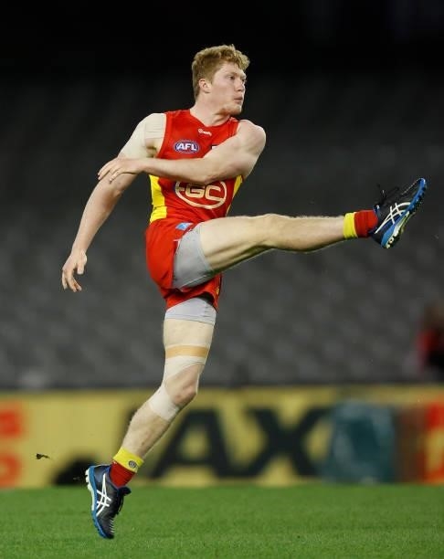Matt Rowell of the Suns kicks the ball during the 2021 AFL Round 20 match between the Gold Coast Suns and the Melbourne Demons at Marvel Stadium on...
