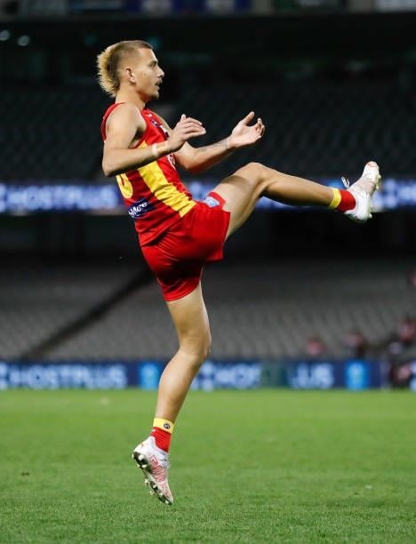 Debutant, Joel Jeffrey of the Suns kicks the ball during the 2021 AFL Round 20 match between the Gold Coast Suns and the Melbourne Demons at Marvel...