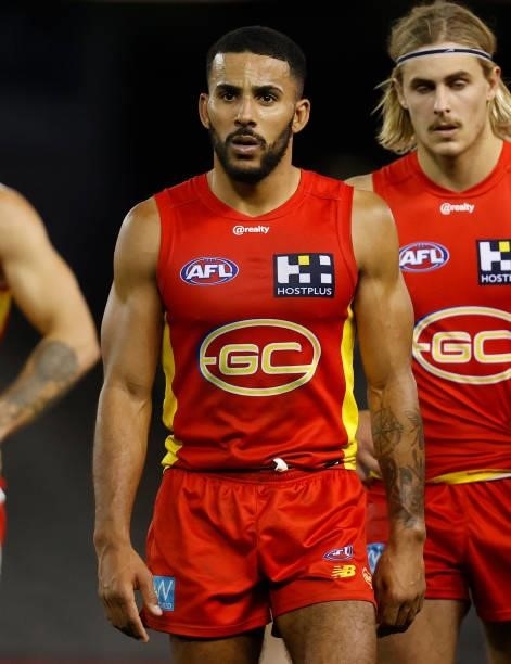 Touk Miller of the Suns looks dejected after a loss during the 2021 AFL Round 20 match between the Gold Coast Suns and the Melbourne Demons at Marvel...