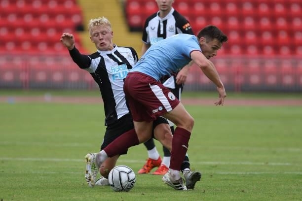 Jack Young of Newcastle United challenges fot the ball during the Pre-season Friendly match between Gateshead and Newcastle United at the Gateshead...