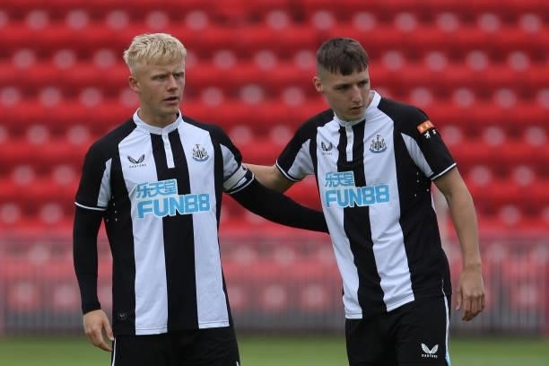 Jack Young of Newcastle United talks to Dylan Stephenson of Newcastle United during the Pre-season Friendly match between Gateshead and Newcastle...