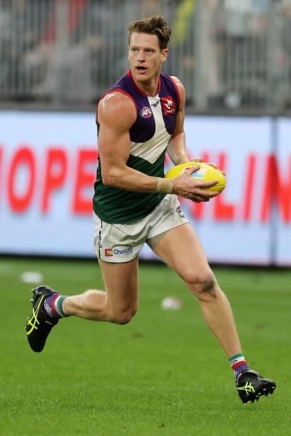 Matt Taberner of the Dockers looks to pass the ball during the 2021 AFL Round 20 match between the Fremantle Dockers and the Richmond Tigers at Optus...
