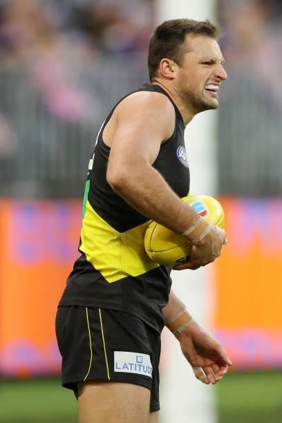 Toby Nankervis of the Tigers winces in pain during the 2021 AFL Round 20 match between the Fremantle Dockers and the Richmond Tigers at Optus Stadium...