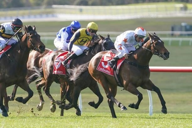 Invincible Jet ridden by Damien Oliver wins the Ladbrokes Easy Form Handicap at Ladbrokes Park Lakeside Racecourse on August 01, 2021 in Springvale,...