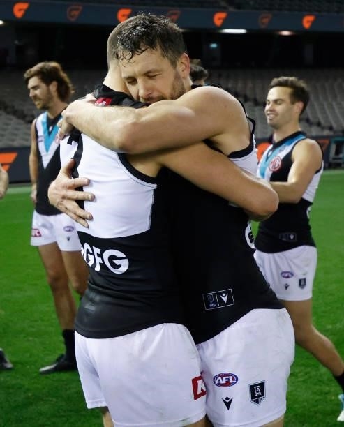 Ryan Burton and Travis Boak of the Power celebrate during the 2021 AFL Round 20 match between the GWS Giants and the Port Adelaide Power at Marvel...
