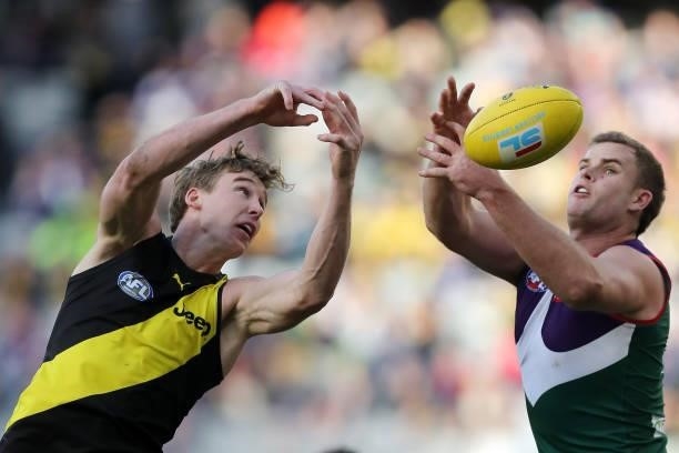 Tom J. Lynch of the Tigers and Sean Darcy of the Dockers during the 2021 AFL Round 20 match between the Fremantle Dockers and the Richmond Tigers at...