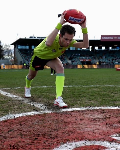 Leigh Haussen practices his bounce before the 2021 AFL Round 20 match between the Hawthorn Hawks and the Brisbane Lions at UTAS Stadium on August 1,...
