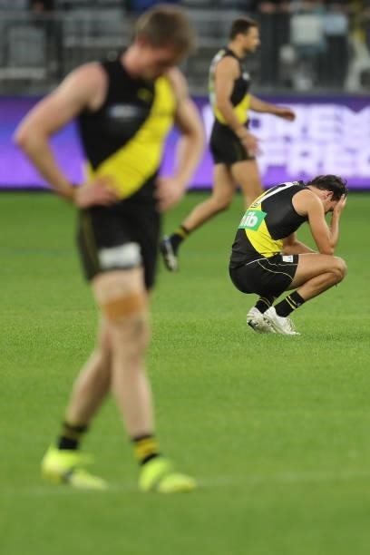 The Tigers react after the teams defeat during the 2021 AFL Round 20 match between the Fremantle Dockers and the Richmond Tigers at Optus Stadium on...
