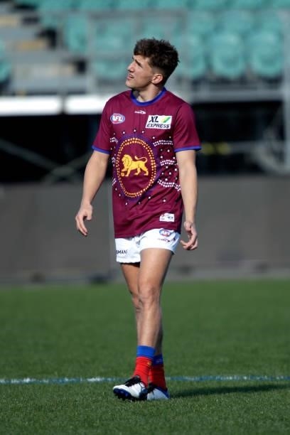 Zac Bailey of the Lions warming up before the 2021 AFL Round 20 match between the Hawthorn Hawks and the Brisbane Lions at UTAS Stadium on August 1,...