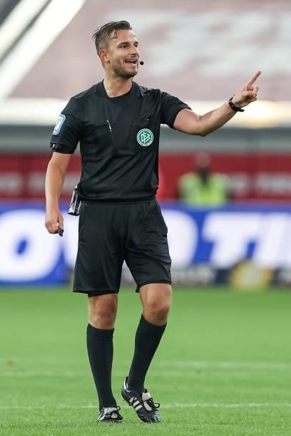 Referee Daniel Schlager gestures during the Second Bundesliga match between Fortuna Duesseldorf and SV Werder Bremen at Merkur Spiel-Arena on July...