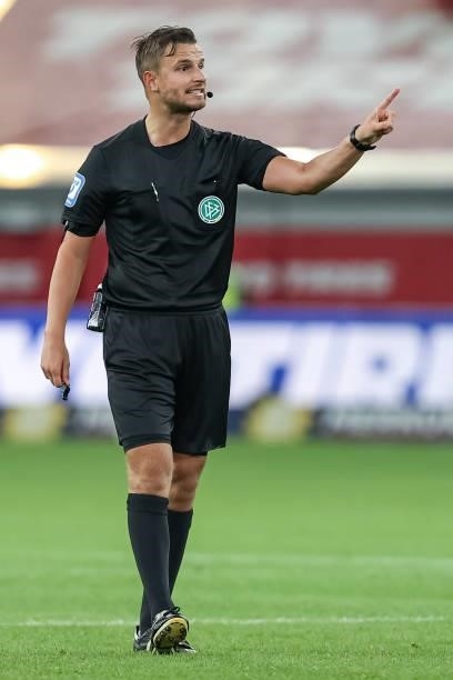 Referee Daniel Schlager gestures during the Second Bundesliga match between Fortuna Duesseldorf and SV Werder Bremen at Merkur Spiel-Arena on July...