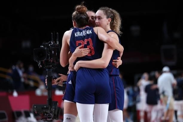 Serbian players celebrate their win in the women's preliminary round group A basketball match between South Korea and Serbia during the Tokyo 2020...