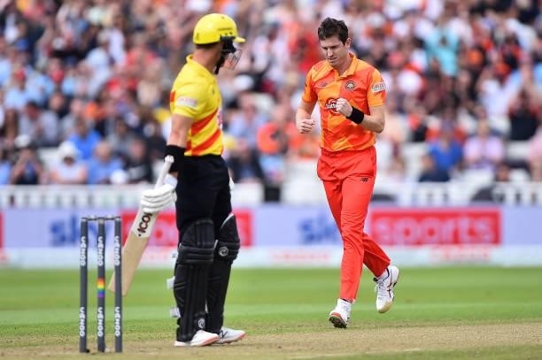 Adam Milne of the Birmingham Phoenix celebrates taking the wicket of D'arcy Short of the Trent Rockets during The Hundred match between Birmingham...