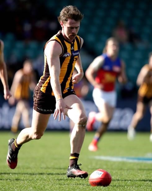 Lachlan Bramble bounces the ball during the 2021 AFL Round 20 match between the Hawthorn Hawks and the Brisbane Lions at UTAS Stadium on August 1,...