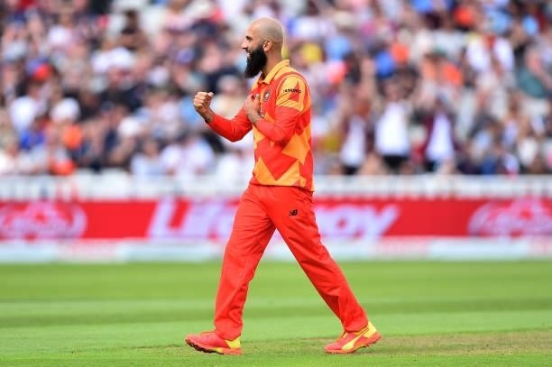 Moeen Ali of the Birmingham Phoenix celebrates taking the wicket of Alex Hales of the Trent Rockets during The Hundred match between Birmingham...