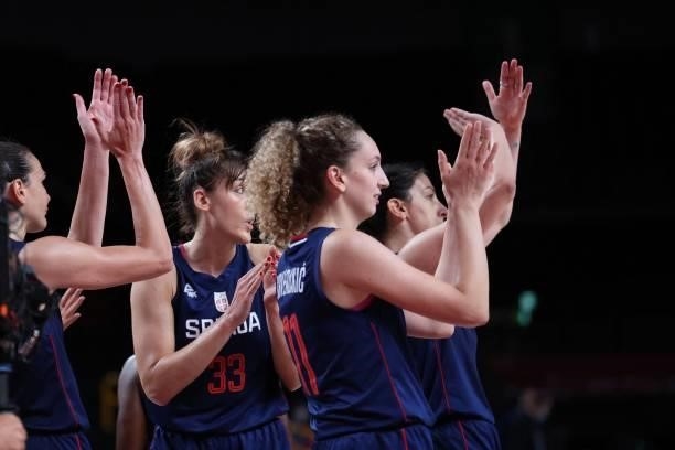 Serbian players celebrate their win in the women's preliminary round group A basketball match between South Korea and Serbia during the Tokyo 2020...