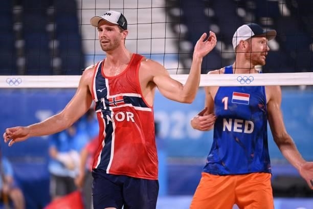 Norway's Anders Berntsen Mol reacts in front of Netherlands' Alexander Brouwer in their men's beach volleyball round of 16 match between Norway and...