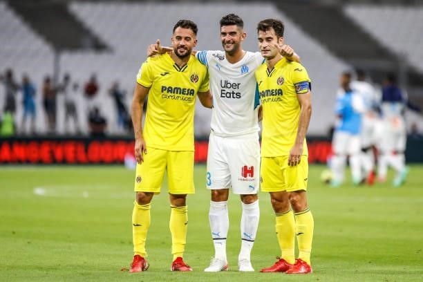 Marios GASPAR of Villarreal, Alvao GONZALEZ of Marseille and Manu TRIGUEROS of Villarreal after the friendly football match between Marseille and...
