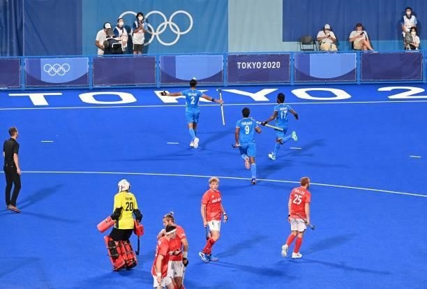 India's Dilpreet Singh celebrates after scoring against Britain during their men's quarter-final match of the Tokyo 2020 Olympic Games field hockey...