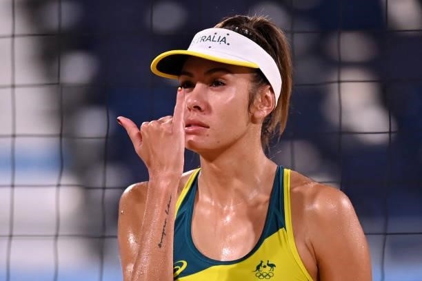 Australia's Taliqua Clancy gestures in their women's beach volleyball round of 16 match between Australia and China during the Tokyo 2020 Olympic...