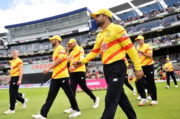 Rashid Khan of the Trent Rockets walks out to field during The Hundred match between Birmingham Phoenix Men and Trent Rockets Men at Edgbaston on...