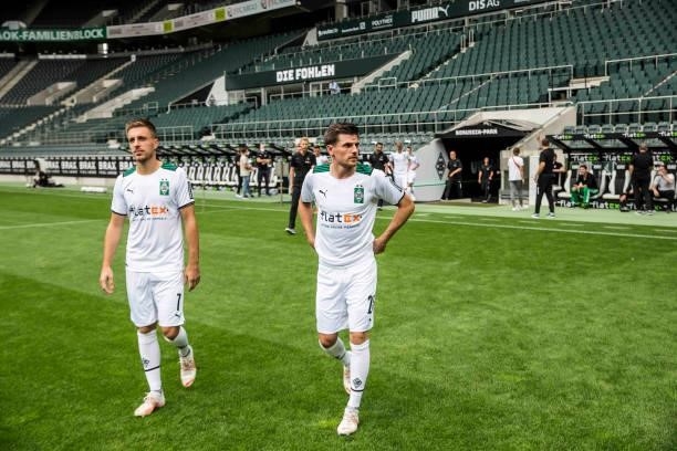 Patrick Herrmann and Jonas Hofmann are seen during the Team Presentation of Borussia Moenchengladbach at Borussia-Park on August 01, 2021 in...