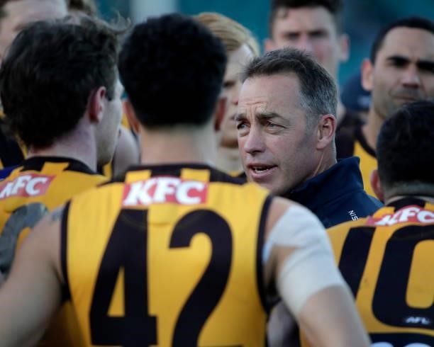 Alastair Clarkson, Senior Coach of the Hawks addresses his players during the 2021 AFL Round 20 match between the Hawthorn Hawks and the Brisbane...