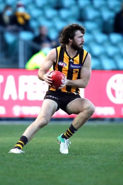 Tom Phillips of the Hawks in action during the 2021 AFL Round 20 match between the Hawthorn Hawks and the Brisbane Lions at UTAS Stadium on August 1,...