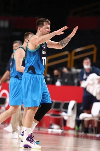 Luka Doncic of the Slovenia Men's National Team high fives teammate during the game against the Spain Men's National Team during the 2020 Tokyo...