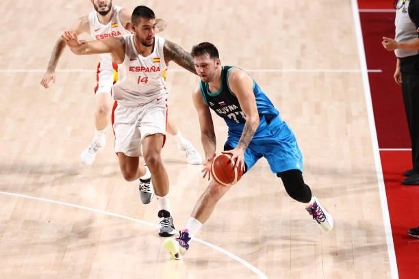 Luka Doncic of the Slovenia Men's National Team drives to the basket and looks to shoots the ball against the Spain Men's National Team during the...
