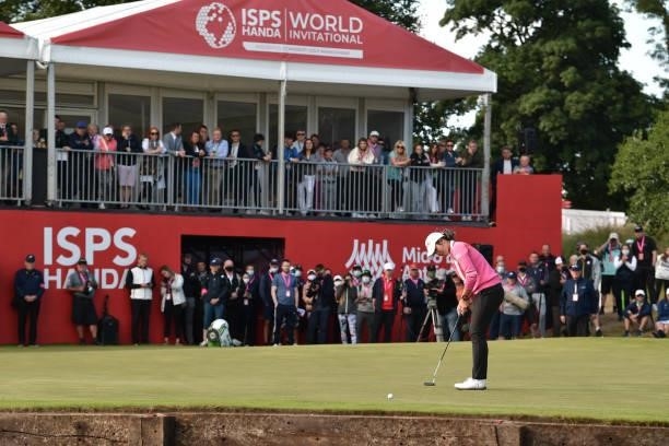 Pajaree Anannarukarn of Thailand putts on the 18th green on the first playoff hole during the final round of the ISPS HANDA World Invitational at...