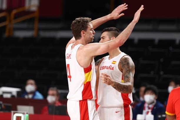 Pau Gasol of the Spain Men's National Team high fives teammates during the game against the Slovenia Men's National Team during the 2020 Tokyo...