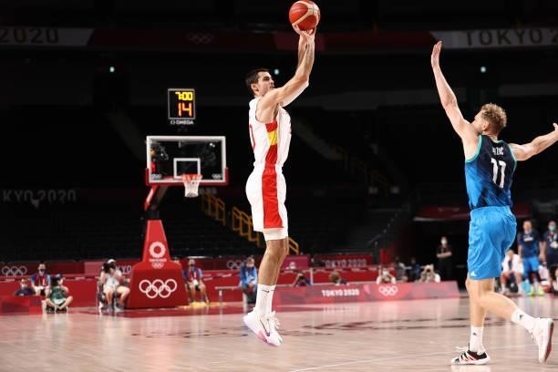 Alberto Abalde of the Spain Men's National Team shoots the ball against the Slovenia Men's National Team during the 2020 Tokyo Olympics at the...