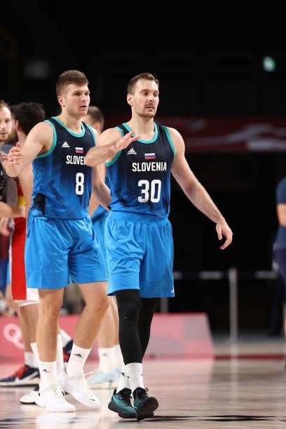 Edo Muric and Zoran Dragic of the Slovenia Men's National Team high five after the game against the Spain Men's National Team during the 2020 Tokyo...