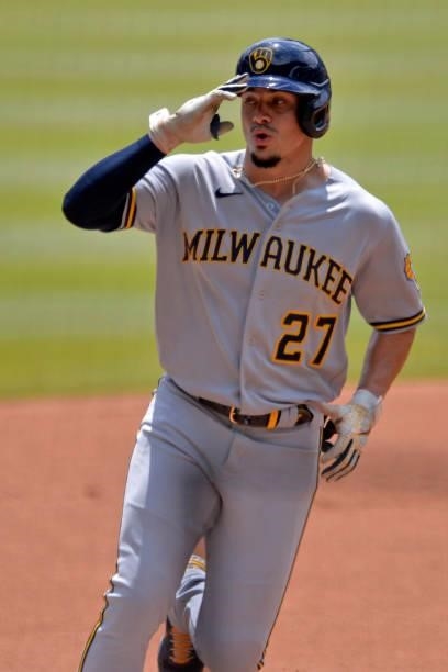 Willy Adames of the Milwaukee Brewers rounds third base after hitting a home run in the first inning against the Atlanta Braves at Truist Park on...