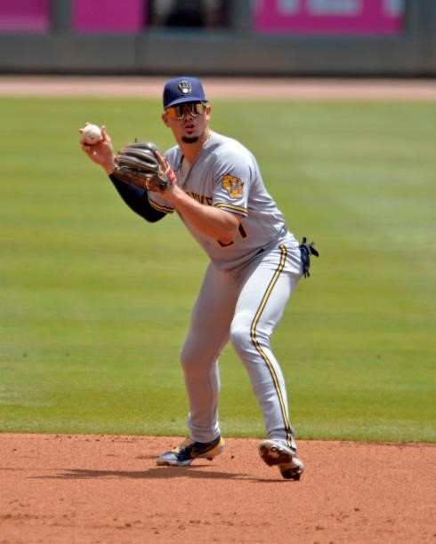 Willy Adames of the Milwaukee Brewers fields a ground ball in the second inning against the Atlanta Braves at Truist Park on August 1, 2021 in...
