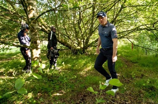 David Horsey of England looks for his ball on the 18th hole during the final round of the ISPS HANDA World Invitational at Galgorm Spa & Golf Resort...