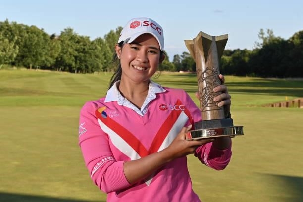 Pajaree Anannarukarn of Thailand poses with the trophy after her victory on the second playoff hole during the final round of the ISPS HANDA World...