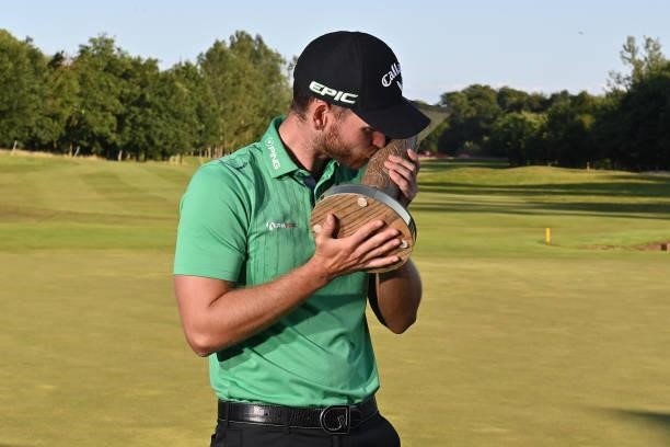 Daniel Gavins of England kisses the trophy after his victory during the final round of the ISPS HANDA World Invitational at Galgorm Spa & Golf Resort...