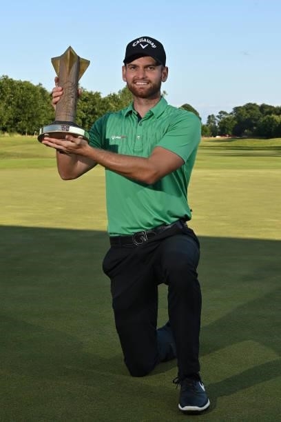 Daniel Gavins of England poses with the trophy after his victory during the final round of the ISPS HANDA World Invitational at Galgorm Spa & Golf...