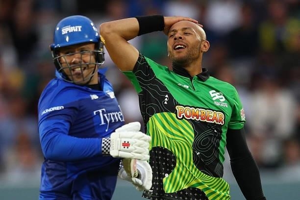 Tymal Mills of Southern Brave reacts as Adam Rossington of London Spirit looks on during The Hundred match between London Spirit Men and Southern...