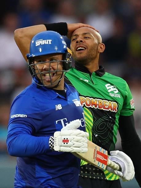 Tymal Mills of Southern Brave reacts as Adam Rossington of London Spirit looks on during The Hundred match between London Spirit Men and Southern...