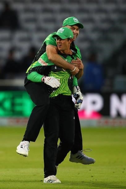 Quinton de Kock of Southern Brave celebrates with team mates after catching Josh Inglis of London Spirit during The Hundred match between London...